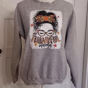 One Thankful Mama Fall Sweatshirt Messy Bun Dark Hair Whimsical Graphic Mom Life